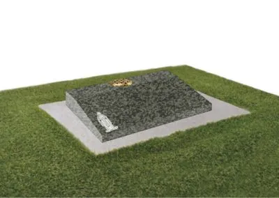 Balmoral green granite desk memorial with engraved ‘mary’ design on matching concrete base.
